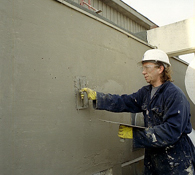 Surface Levelling and Sealing of Concrete Repairs to a Parapet Wall Surface NCC